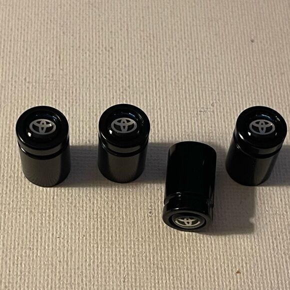 Toyota Logo valve Stem caps in black set of 4 NWT - Picture 2 of 4